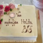 Torta z napisom "Vse najboljše Hilda 80".